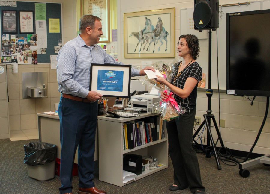 John Annis of Barancik Foundation presents a check to Venice High School teacher Brittany Smith